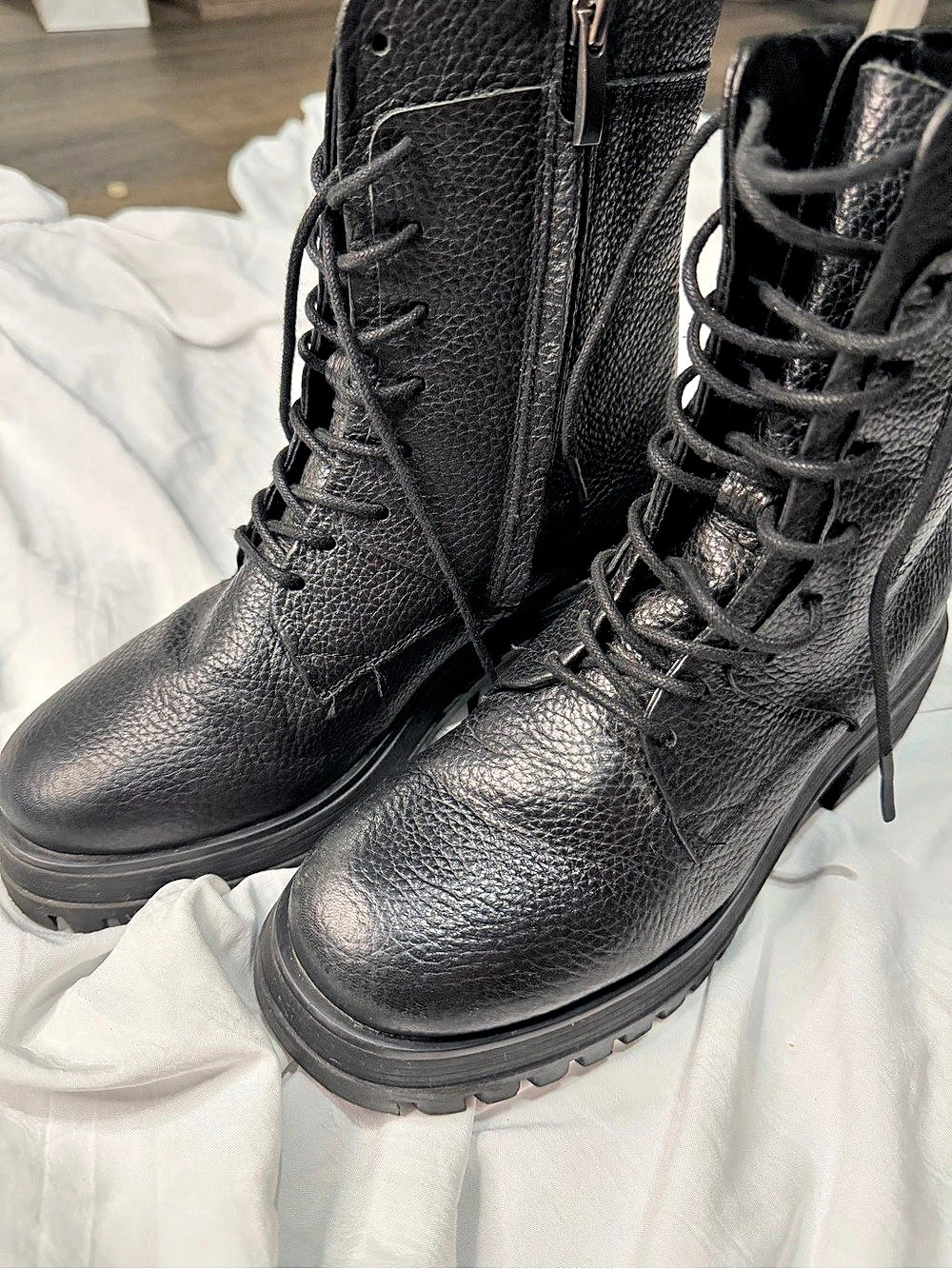 Franco Sarto black leather combat boots.